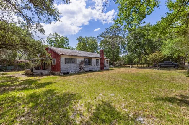front view of a house with a big yard