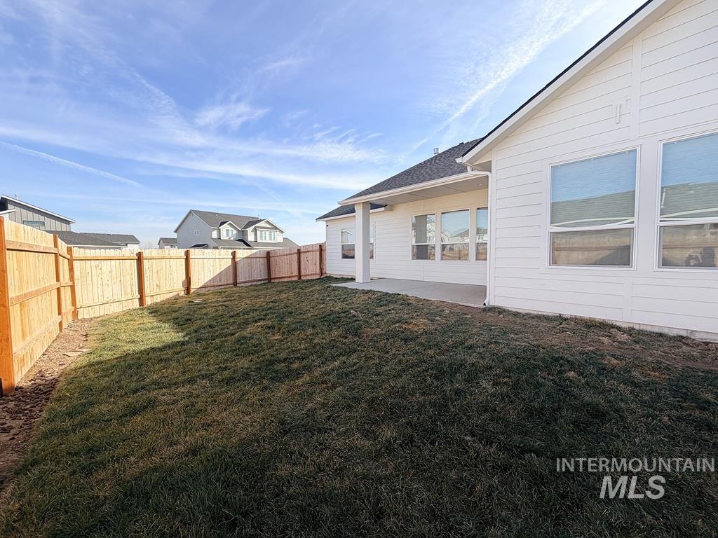 13694 Oliver Street Caldwell, ID 83607 - Photo 27 of 28 Fenced backyard featuring a patio area