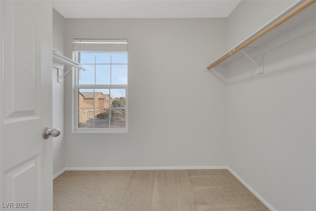 4549 Lime Straight Drive Las Vegas, NV 89115 - Photo 19 of 21 Walk in closet featuring light carpet