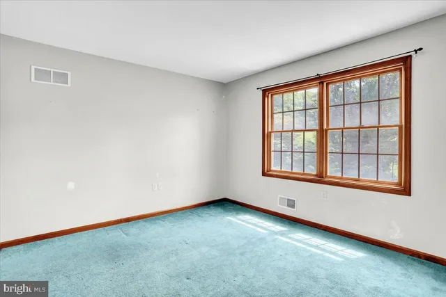 an empty room with a window