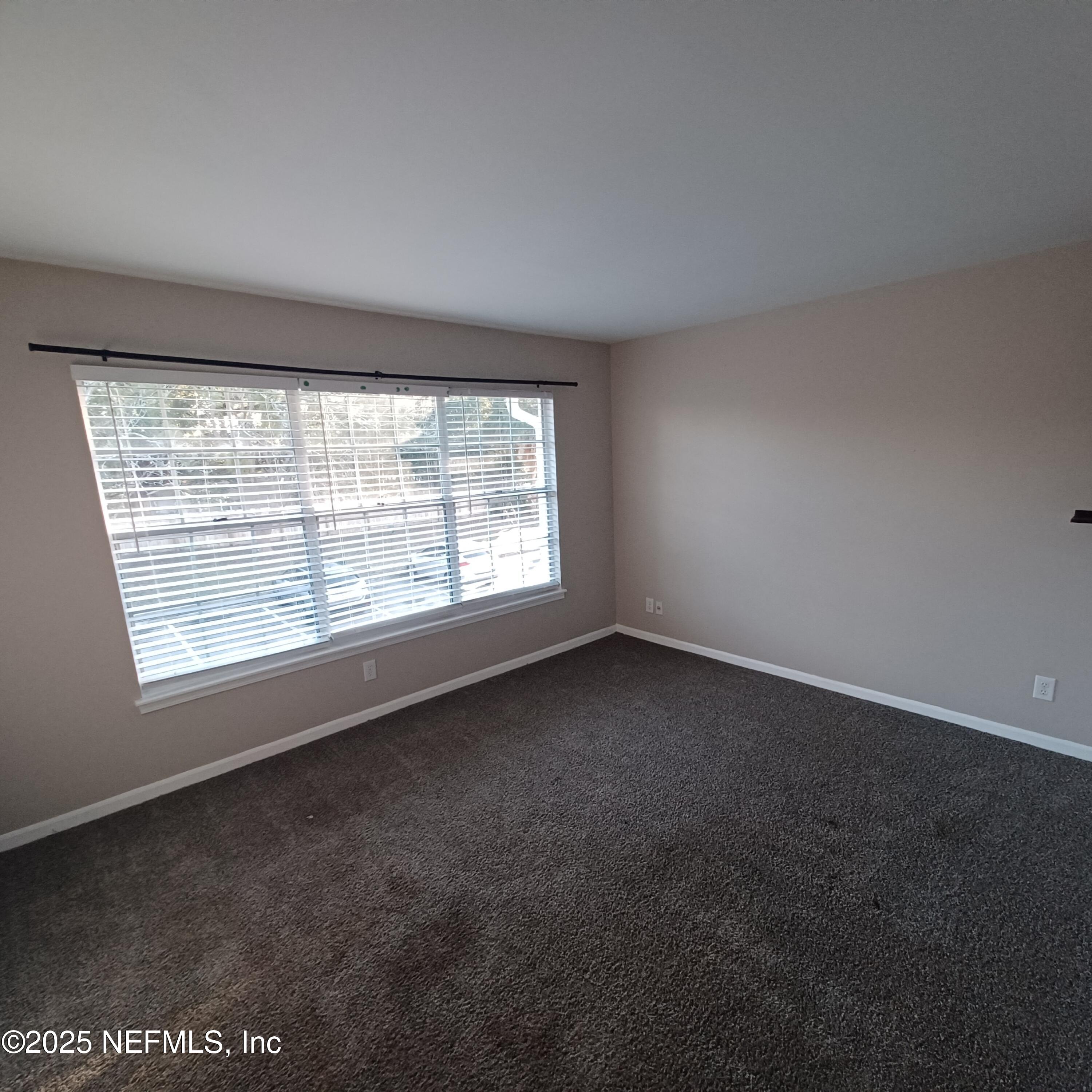 307 Kettering Terrace Orange Park, FL 32073 - Photo 12 of 16 an empty room with a window