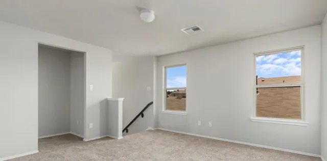 an empty room with windows