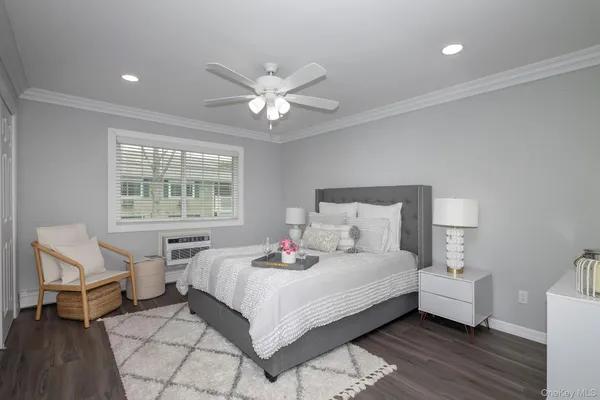a bed room with a bed and a window