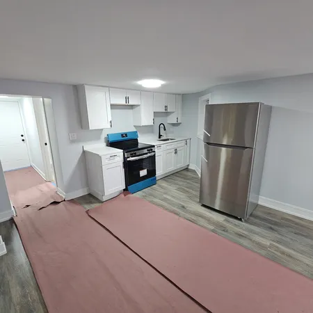 a bathroom with a sink toilet and bathtub