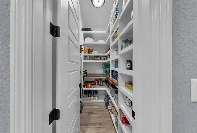 a view of a room with window and sitting area