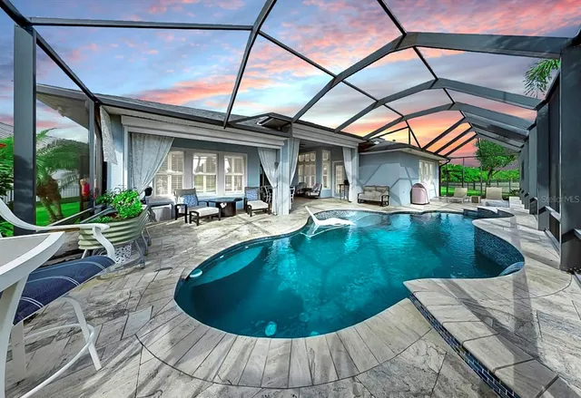 a balcony with furniture and a potted plant