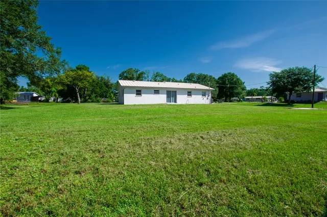 a house view with a garden space