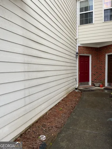 a view of a house with a garage