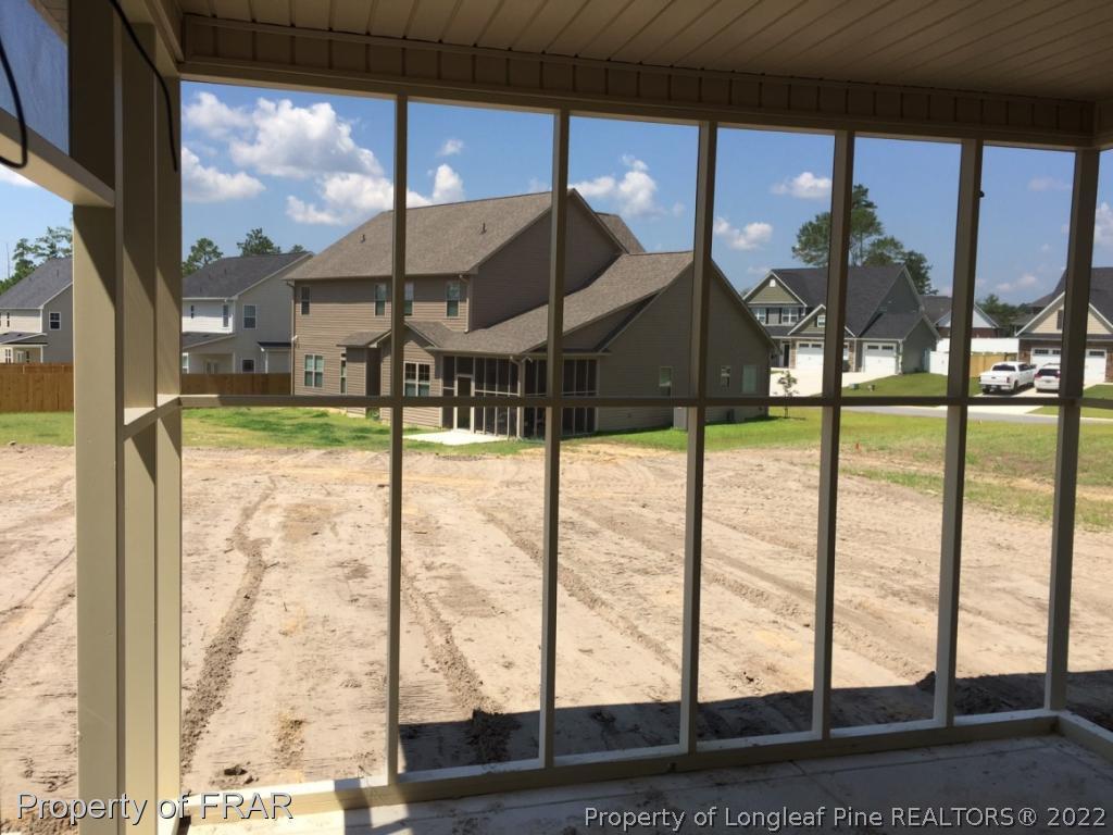 4778 McKinnon Farm Road Fayetteville, NC 28304 - Photo 17 of 18 a view of living room with floor to ceiling window