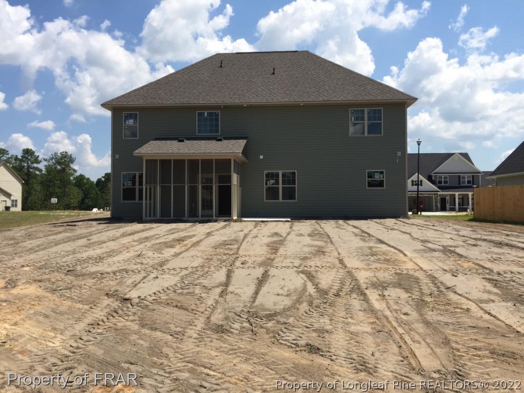 4778 McKinnon Farm Road Fayetteville, NC 28304 - Photo 18 of 18 a front view of a house with a yard