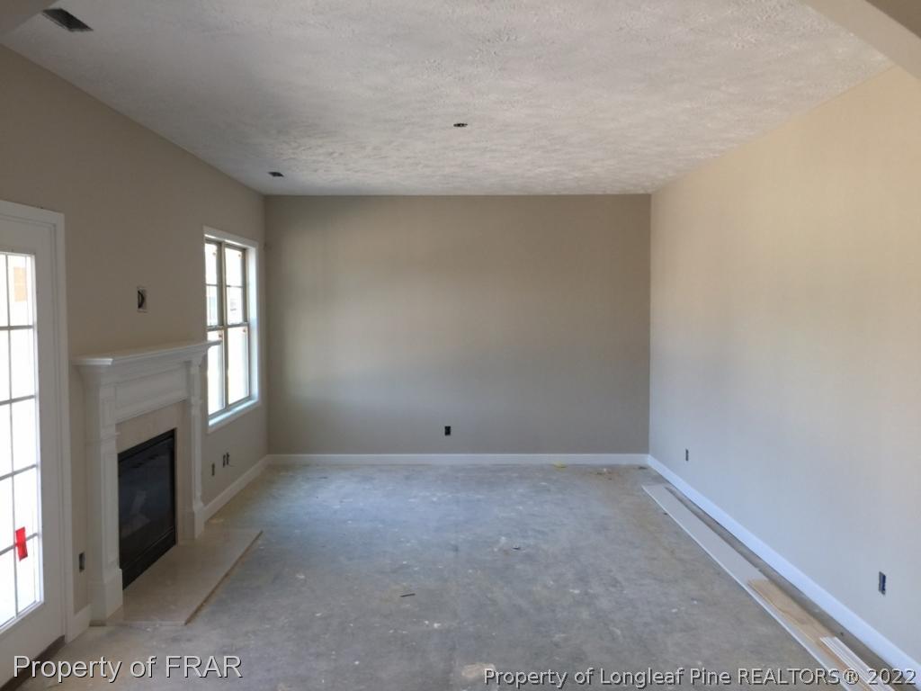 4778 McKinnon Farm Road Fayetteville, NC 28304 - Photo 9 of 18 an empty room with windows