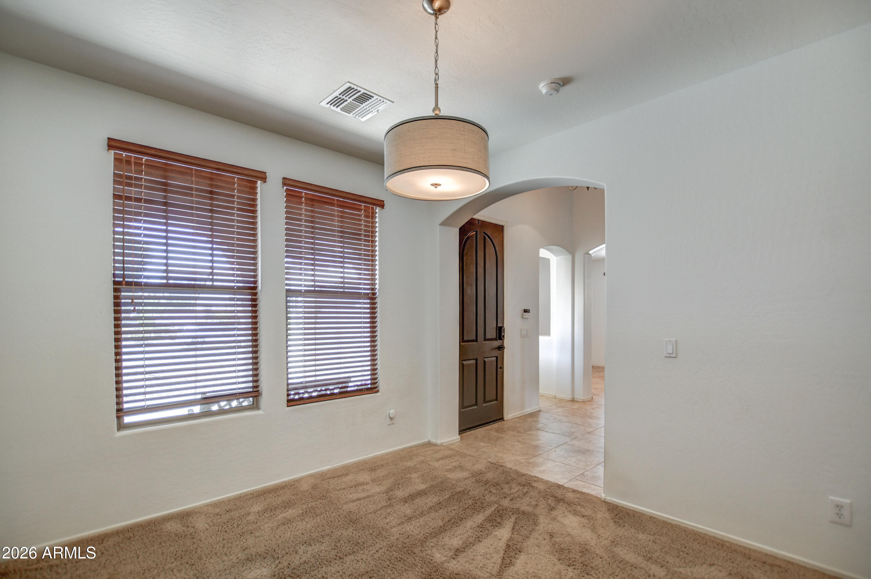 3078 East Muirfield Street Gilbert, AZ 85298 - Photo 18 of 92 a view of a livingroom and a window