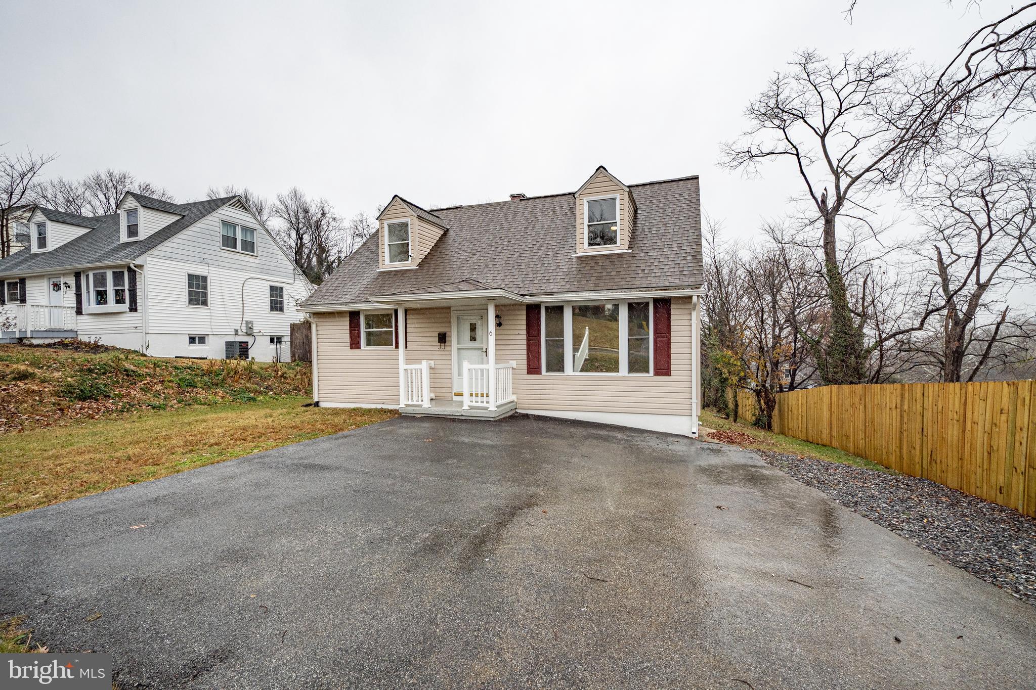 6 Mountain Road Linthicum Heights, MD 21090 - Photo 35 of 41 a front view of a house with a yard and garage