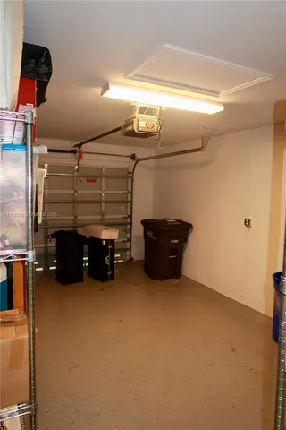 a view of room with furniture and a ceiling fan