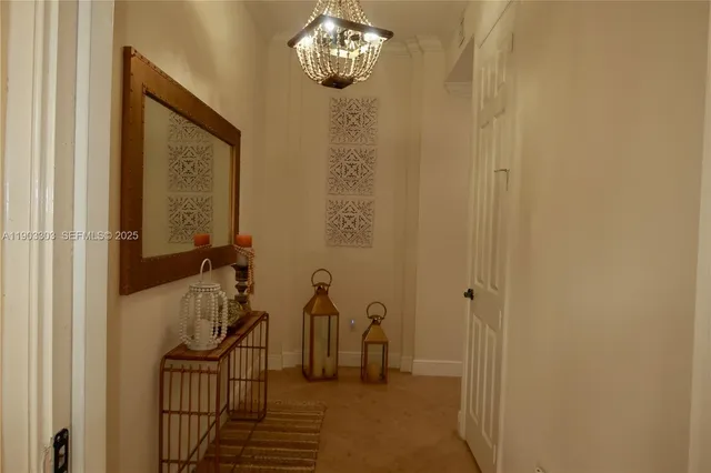 a view of a livingroom with furniture and a gate