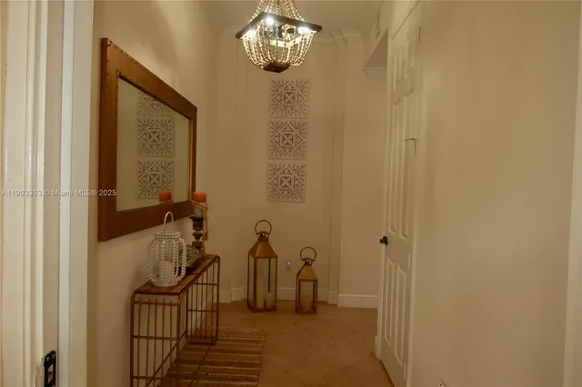 a view of a livingroom with furniture and a gate