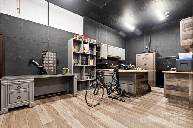 a view of an empty room with a bedroom