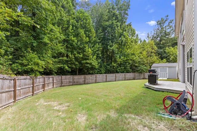 a view of a backyard with a garden