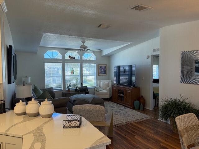 65 Turquoise Avenue Naples, FL 34114 - Photo 11 of 34 a living room with furniture fireplace and a large window
