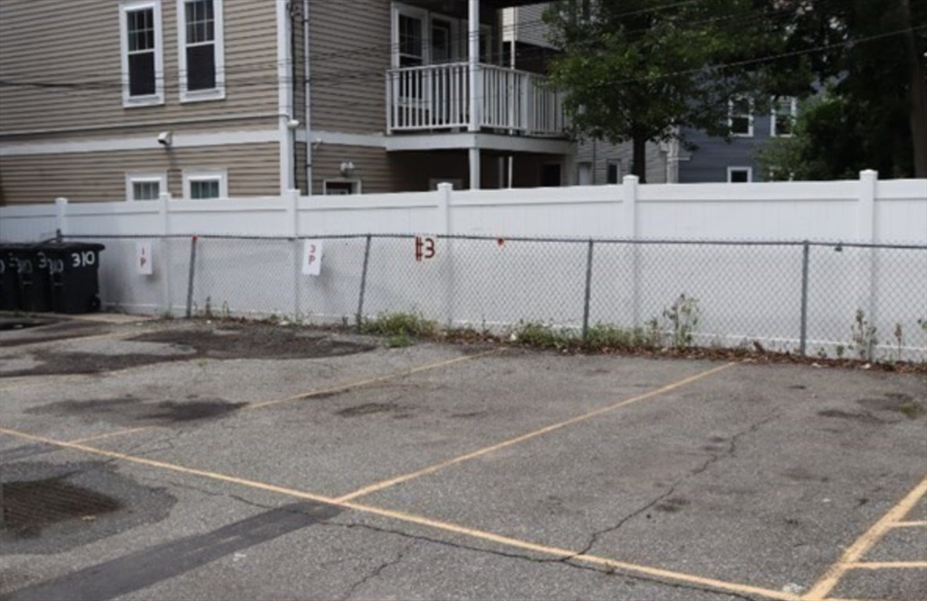 310 Talbot Avenue, Unit 2 Boston, MA 02124 - Photo 13 of 16 a view of a street with house