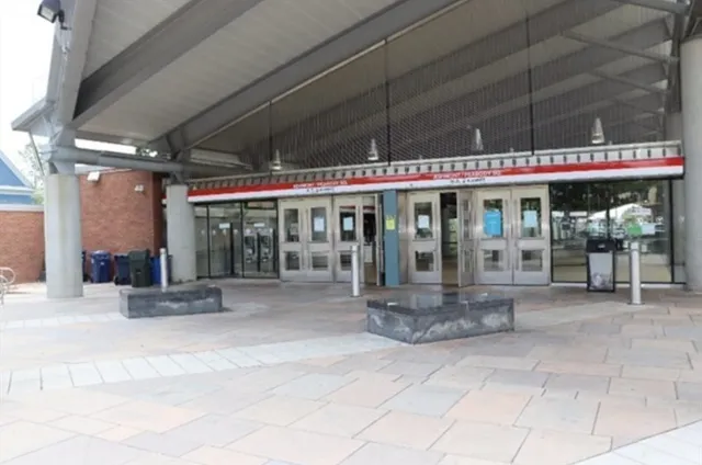 a view of a cafe with sitting area