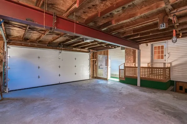 a view of a room with wooden walls