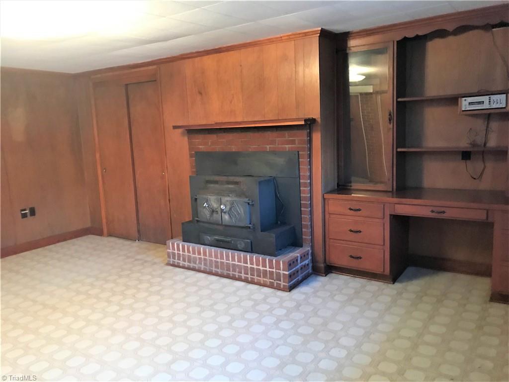 141 Setliff Road Reidsville, NC 27320 - Photo 16 of 20 Den with fireplace