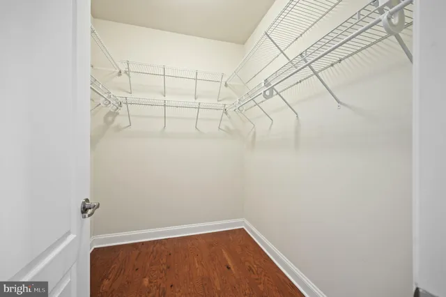 a view of a room with racks on the wall