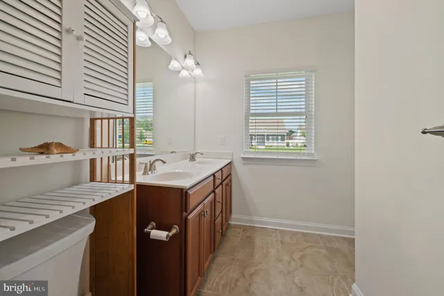 a utility room with closet a washer and dryer