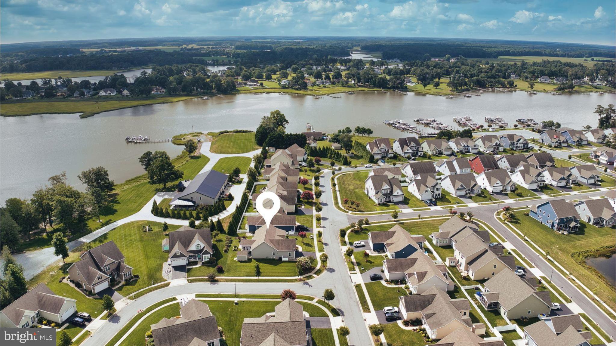 33301 Bayberry Court Dagsboro, DE 19939 - Photo 38 of 44 an aerial view of residential houses with outdoor space and lake view