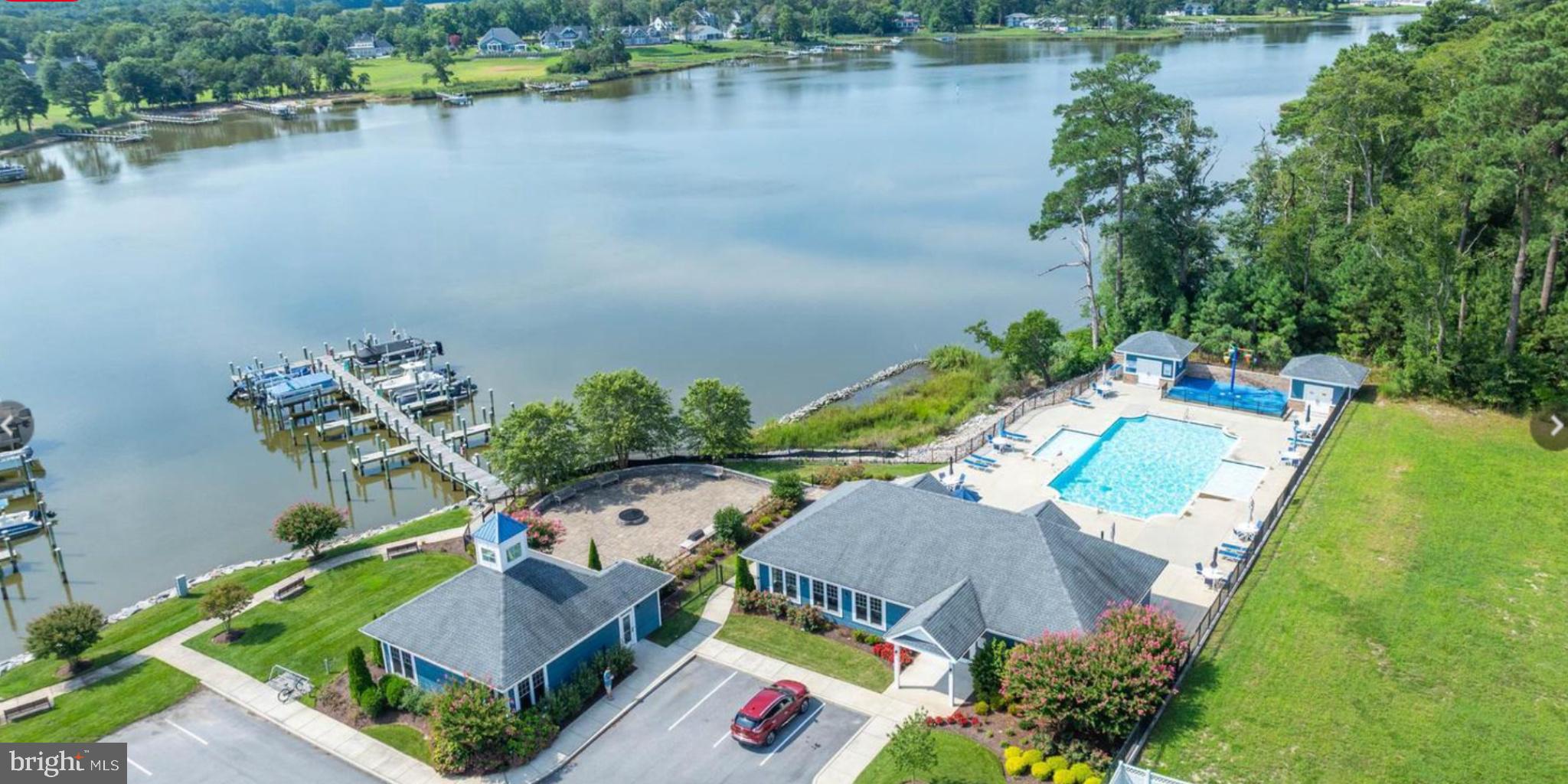 33301 Bayberry Court Dagsboro, DE 19939 - Photo 42 of 44 an aerial view of a house with outdoor space and lake view