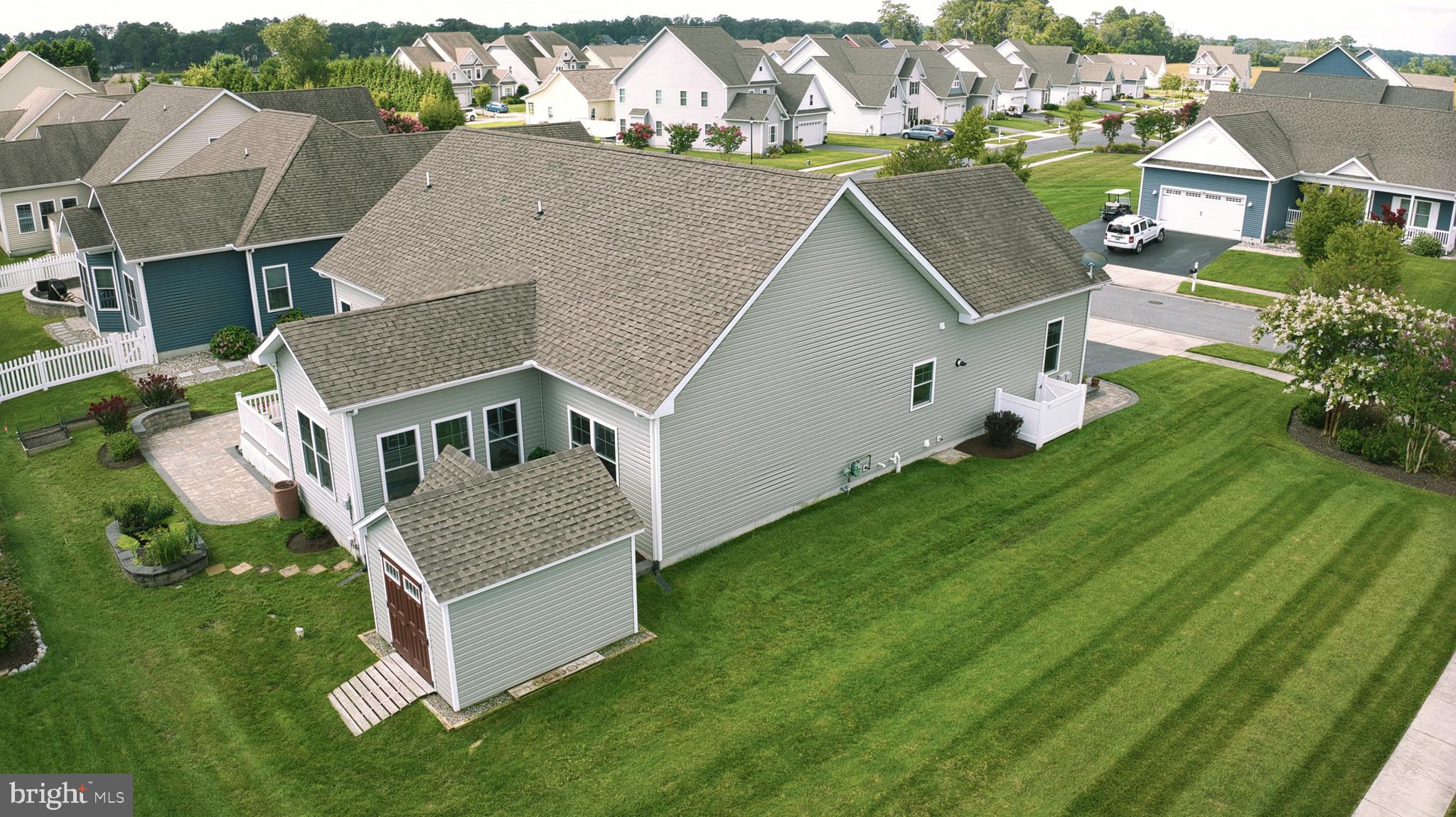 33301 Bayberry Court Dagsboro, DE 19939 - Photo 9 of 44 an aerial view of a house with a yard