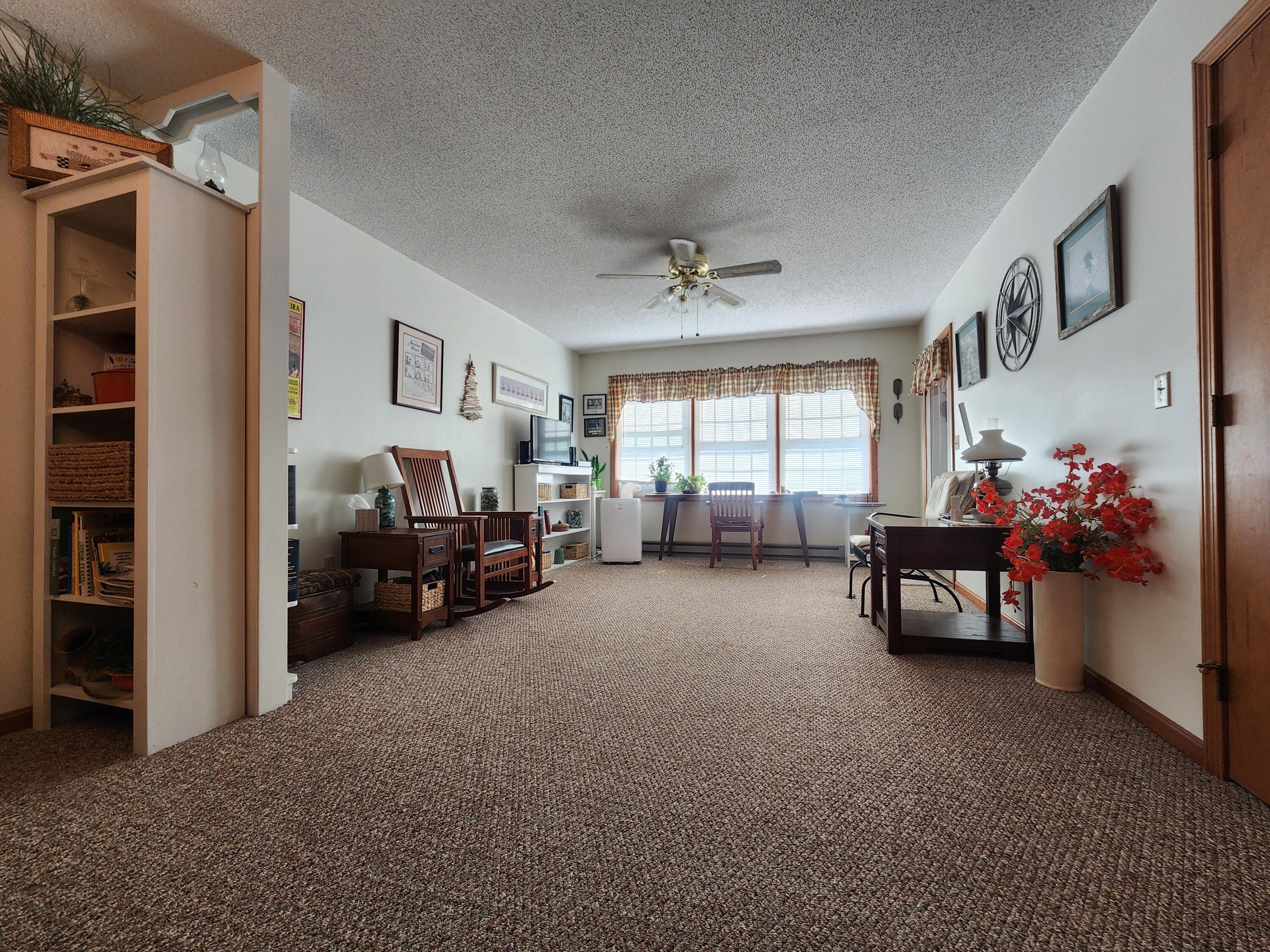 75 Halifax Street, Unit D31 Winslow, ME 04901 - Photo 18 of 37 Living Room