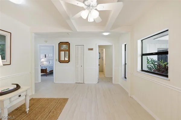 workspace with wooden floor and window