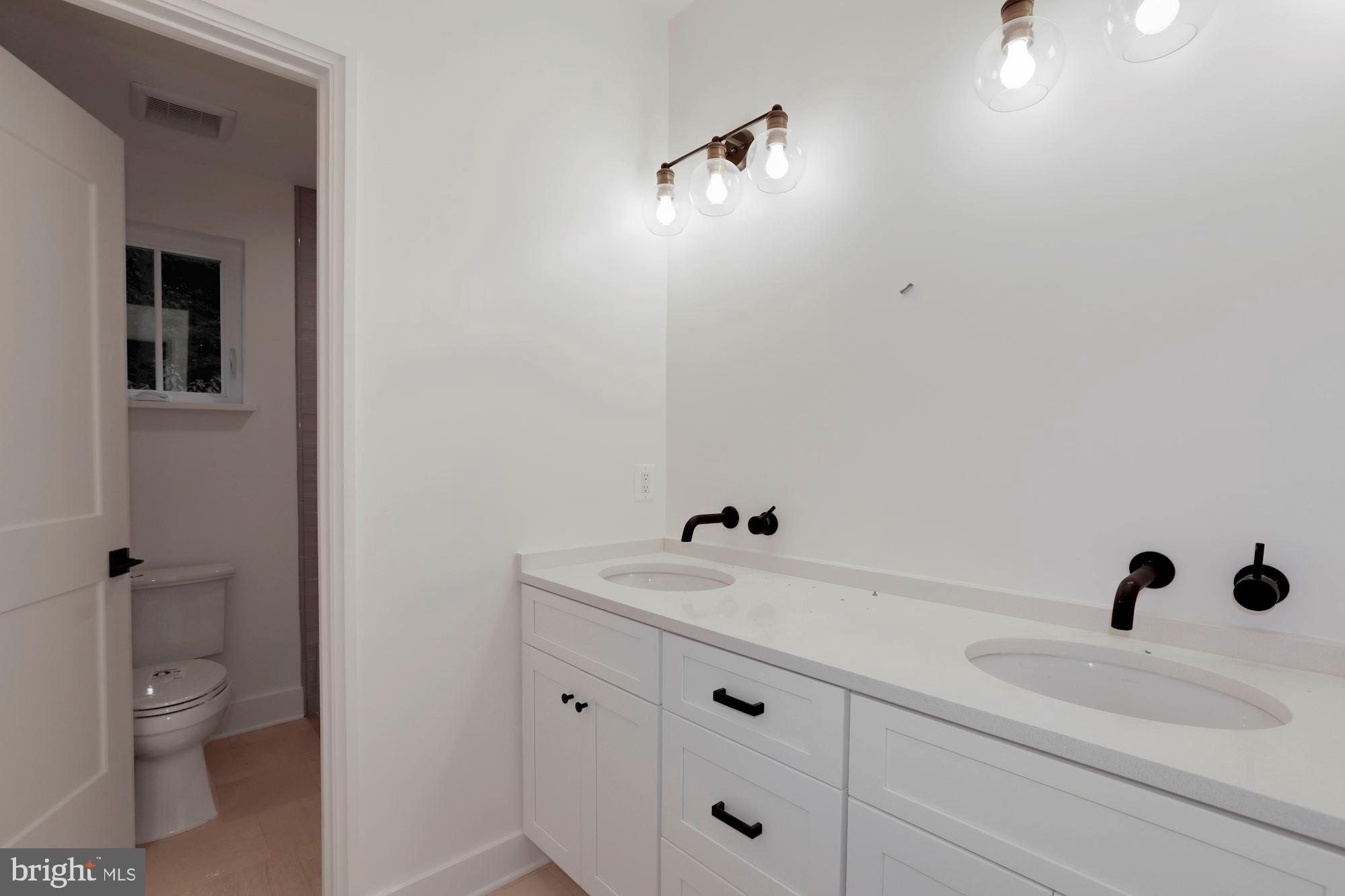 5703 A Ridgefield Road Bethesda, MD 20816 - Photo 36 of 47 Jack and Jill Bathroom