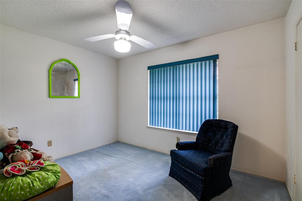 1916 Cobblestone Lane Garland, TX 75042 - Photo 28 of 33 Sitting room featuring carpet floors and ceiling fan