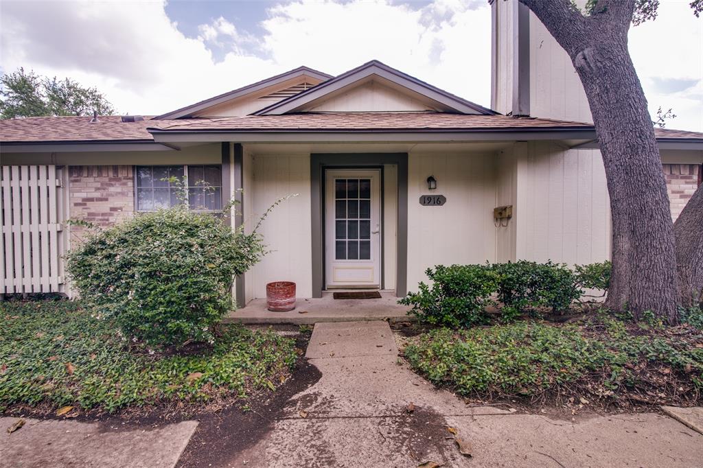 1916 Cobblestone Lane Garland, TX 75042 - Photo 7 of 33 Doorway to property with roof with shingles