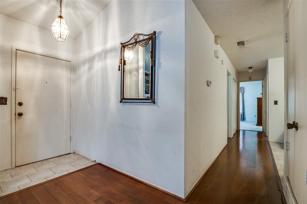 1916 Cobblestone Lane Garland, TX 75042 - Photo 8 of 33 Entryway with hardwood / wood-style flooring