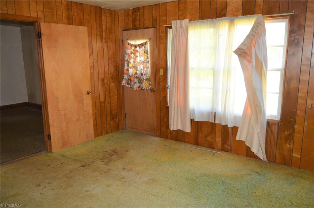 8600 Fulp Road Stokesdale, NC 27357 - Photo 27 of 30 Front bedroom has the home's 2nd front door