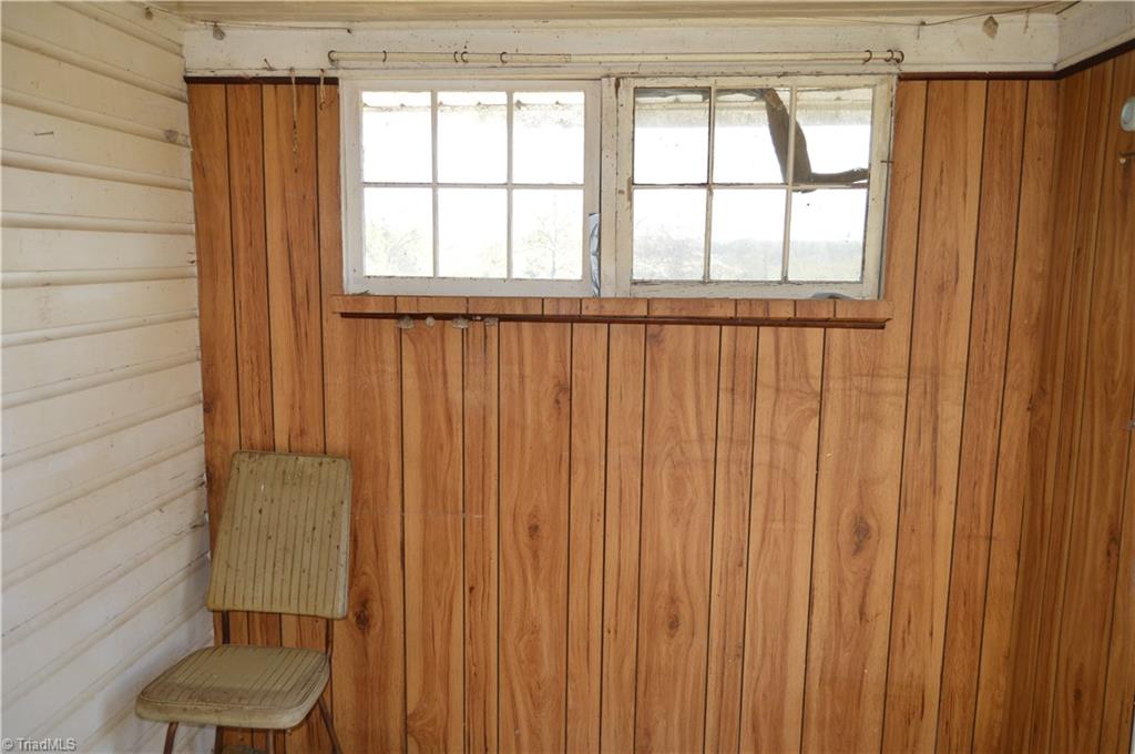 8600 Fulp Road Stokesdale, NC 27357 - Photo 30 of 30 Enclosed rear porch