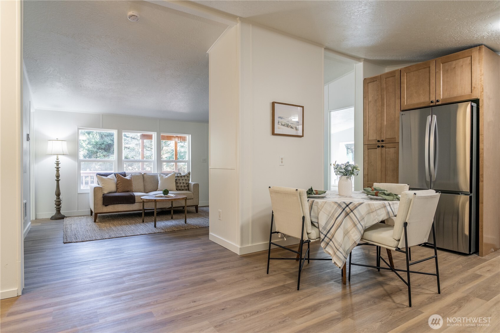 3408 Old Highway 99 North Road Burlington, WA 98233 - Photo 12 of 38 a living room with furniture and wooden floor