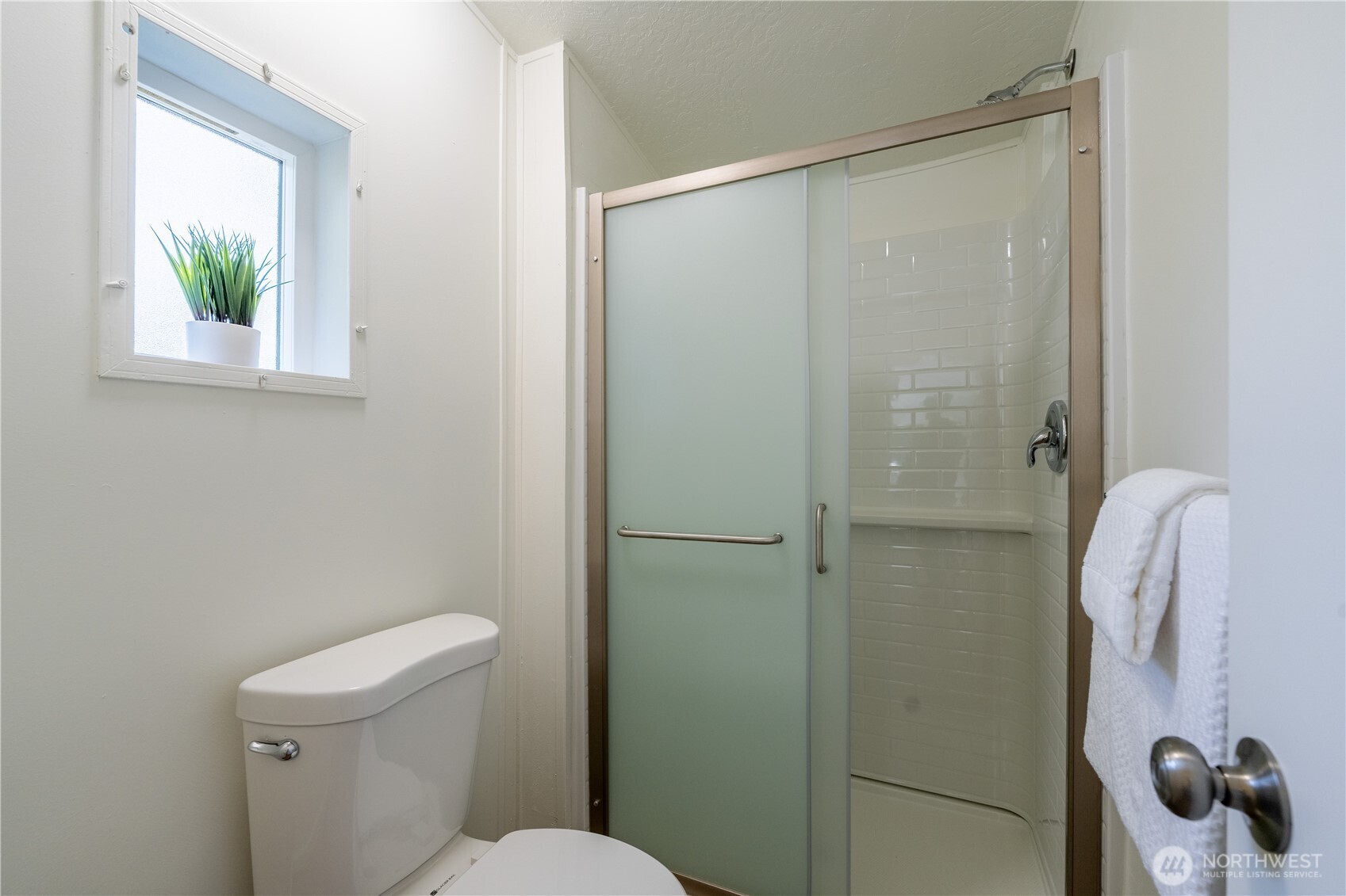 3408 Old Highway 99 North Road Burlington, WA 98233 - Photo 18 of 38 a bathroom with a shower and a toilet