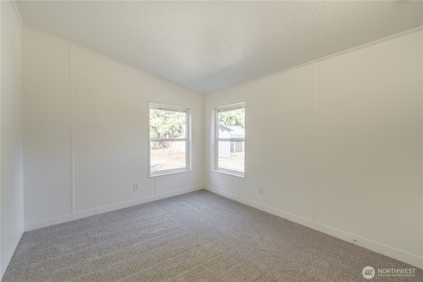 3408 Old Highway 99 North Road Burlington, WA 98233 - Photo 26 of 38 an empty room with windows