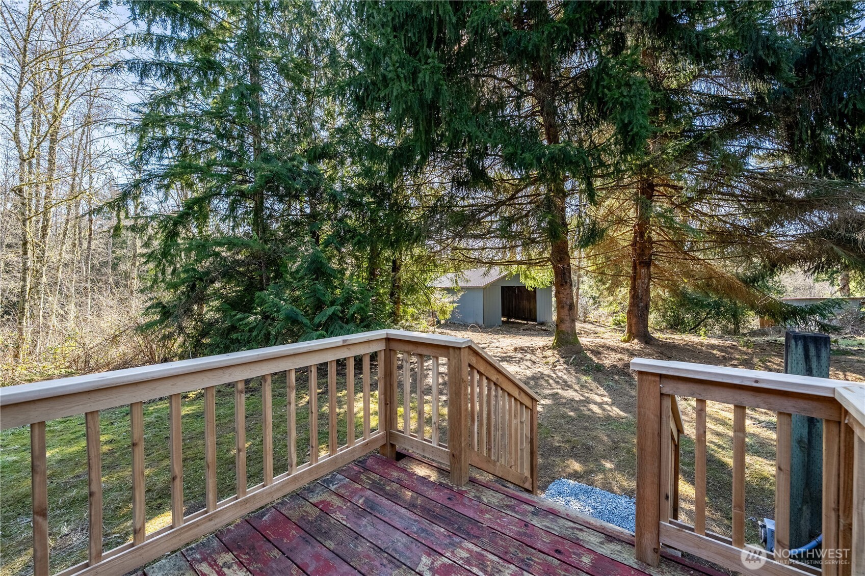 3408 Old Highway 99 North Road Burlington, WA 98233 - Photo 29 of 38 a view of a balcony with wooden floor