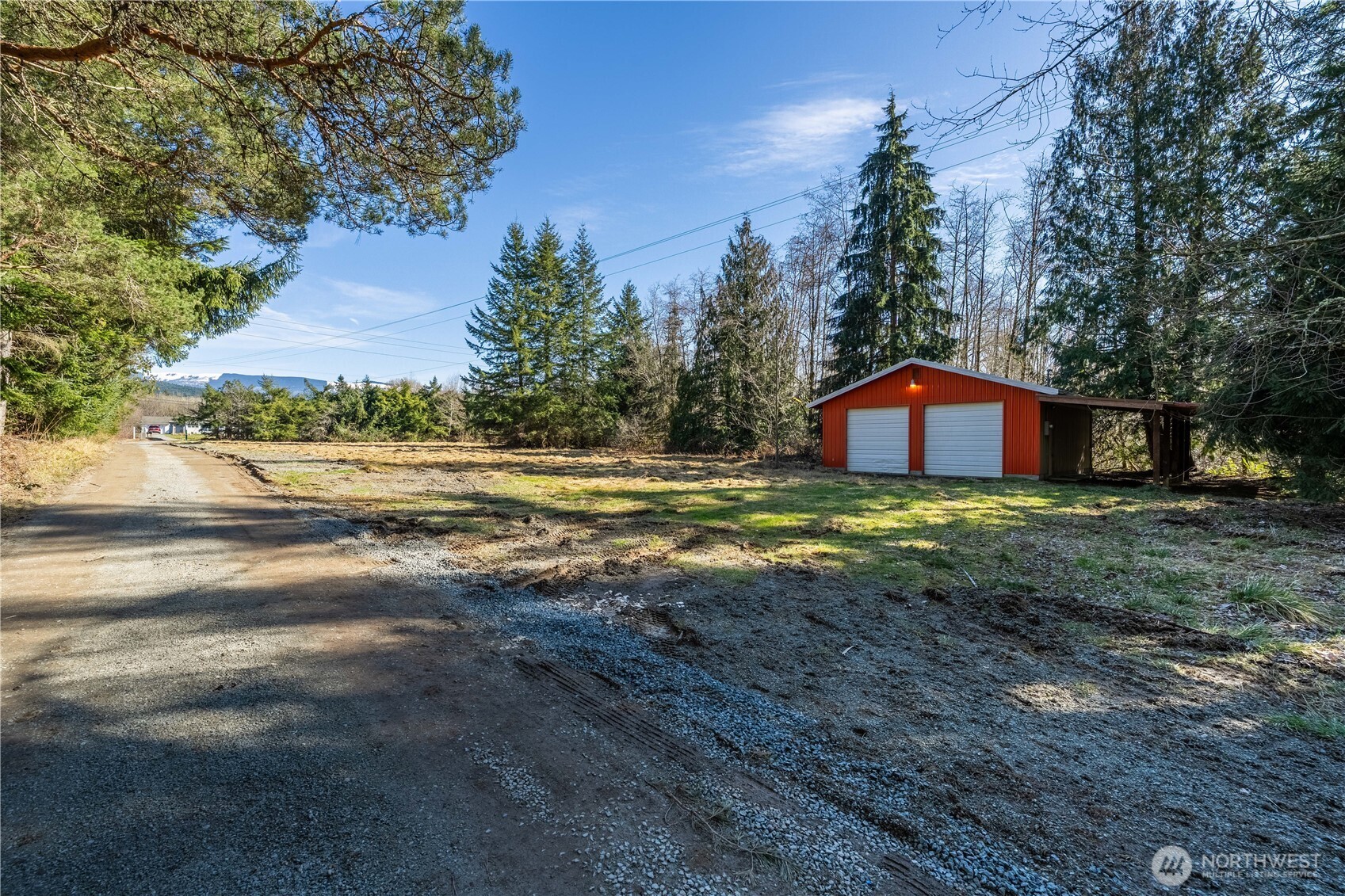 3408 Old Highway 99 North Road Burlington, WA 98233 - Photo 37 of 38 a view of an house with backyard and trees