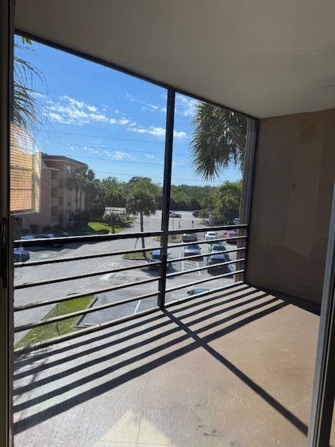 3100 North Pine Island Road, Unit 301 Sunrise, FL 33351 - Photo 4 of 9 LC Balcony view from dining