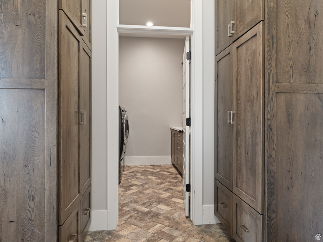 641 West 500 South Midway, UT 84049 - Photo 19 of 52 Hallway featuring custom wood-finish cabinetry, contemporary hardware, and recessed lighting