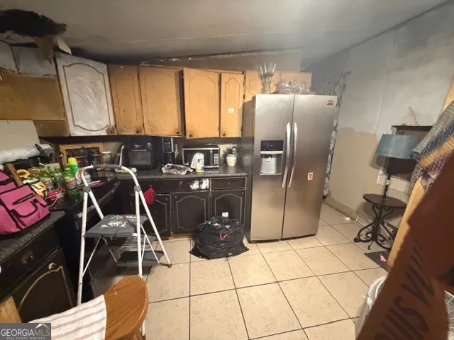 a room with gym equipment and windows