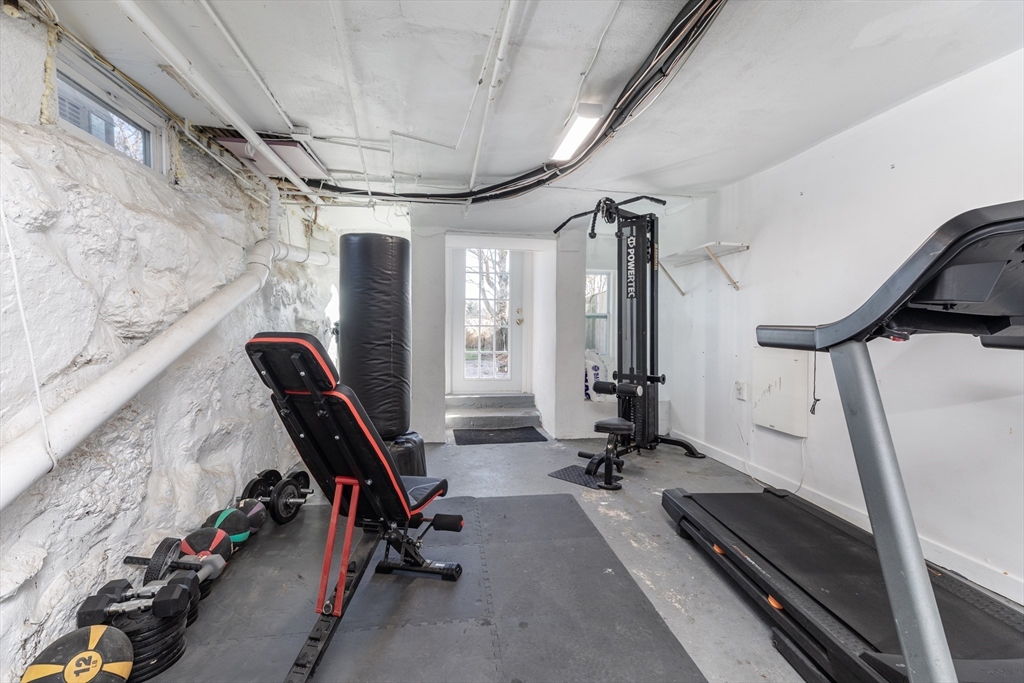1076 Adams Street Boston, MA 02124 - Photo 23 of 29 a view of a room with gym equipment