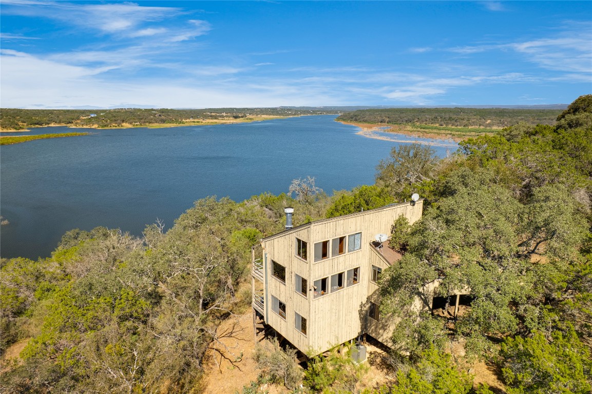 501 Coventry Road Spicewood, TX 78669 - Photo 1 of 24 a view of a city and an ocean view